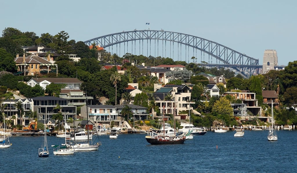 The Harbour Bridge is seen in the backdrop of the Sydney suburb of Woolwich. Photo: Bloomberg