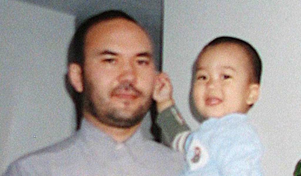 Huseyin Celil and one of his youngest children in a photo taken shortly before his arrest in Uzbekistan in 2006. Photo: Handout