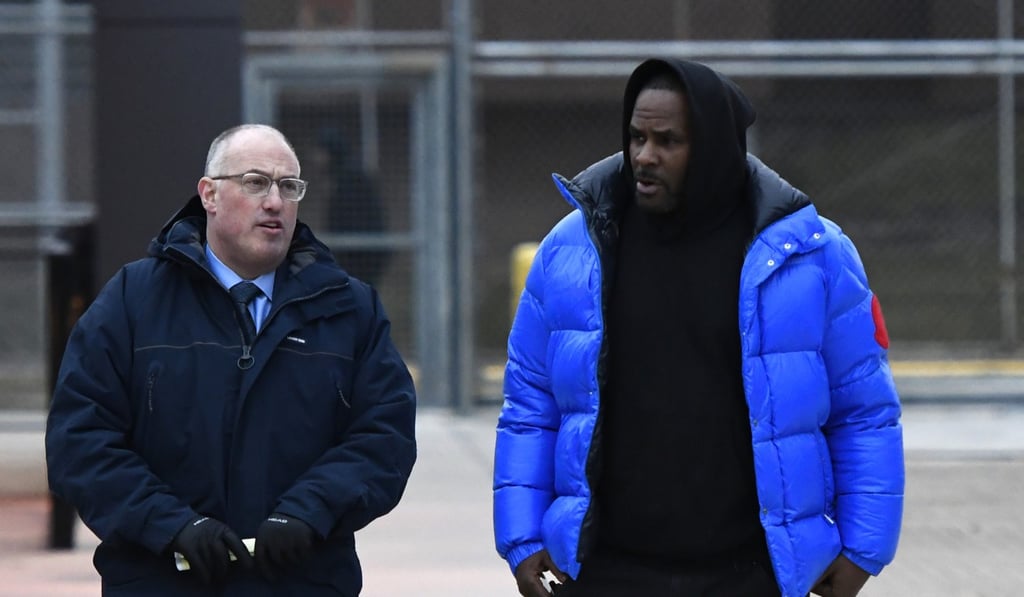 R. Kelly, right, leaves Cook County Jail with his defence attorney, Steve Greenberg, in Chicago. Photo: AP Photo R. Kelly, right, leaves Cook County Jail with his defence attorney, Steve Greenberg, in Chicago. Photo: AP Photo