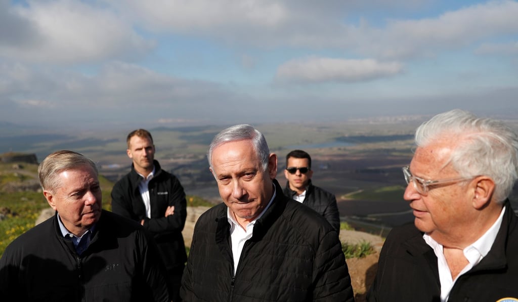 Israeli Prime Minister Benjamin Netanyahu, US Republican Senator Lindsey Graham and US Ambassador to Israel David Friedman visit the border line between Israel and Syria at the Israeli-occupied Golan Heights on March 11. Photo: Reuters