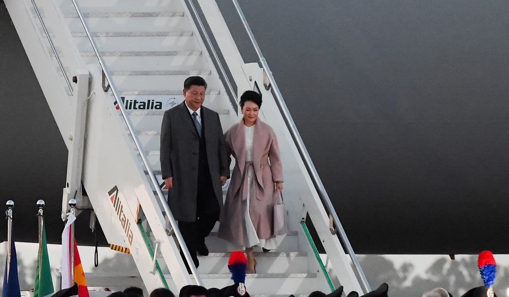 Chinese President Xi Jinping and his wife Peng Liyuan land at Rome's Fiumicino airport for a two-day visit to Italy. Photo: AFP Chinese President Xi Jinping and his wife Peng Liyuan land at Rome's Fiumicino airport for a two-day visit to Italy. Photo: AFP