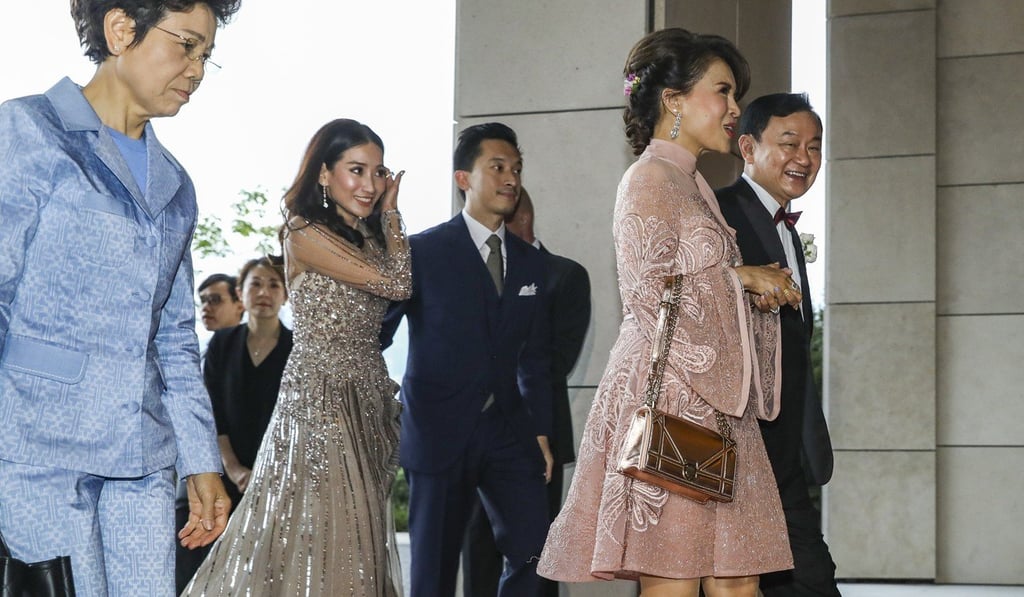 Thaksin (right) with Princess Ubolratana, followed by his daughter Pintongtha ‘Aim’ and Aim's husband Natthapong Kunakornwong. Photo: Sam Tsang
