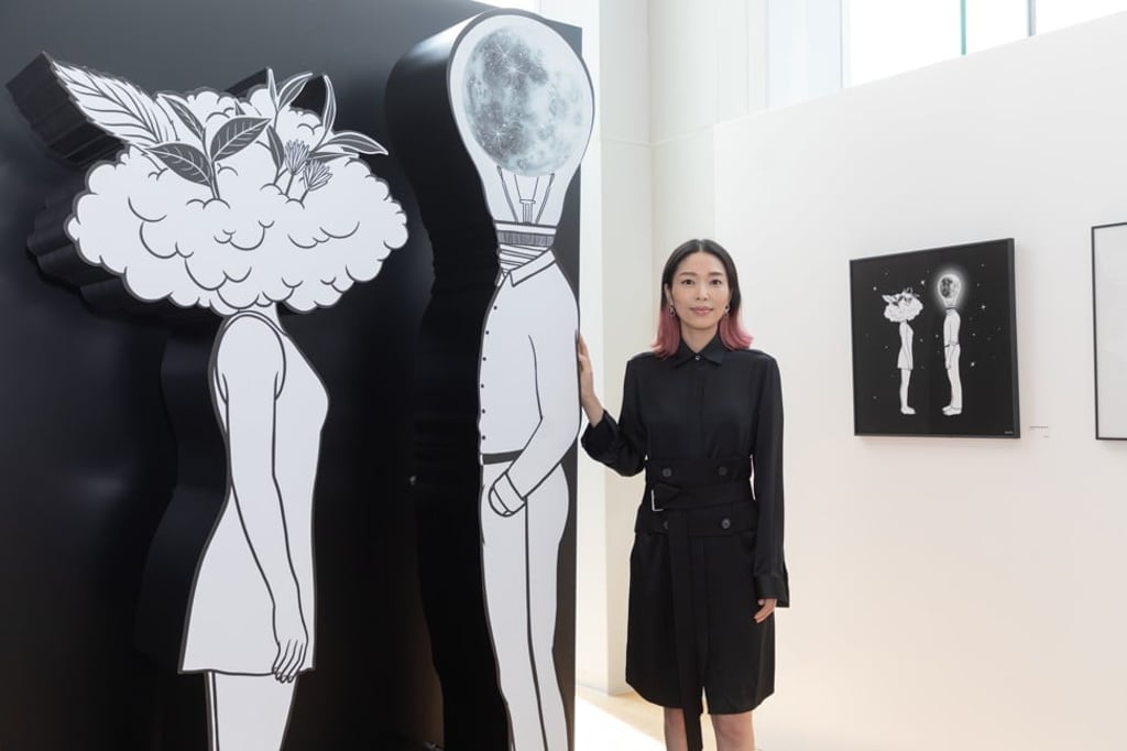 Kim with some of her creations at her solo show in Harbour City.