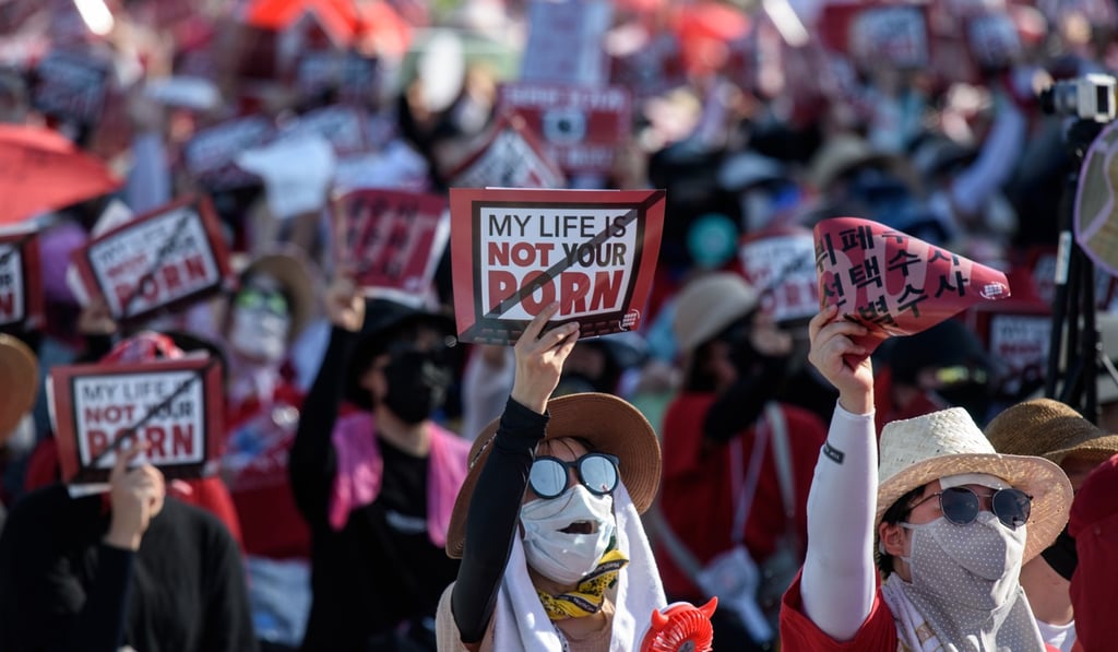 Female protesters shout slogans during a rally against 'spycam porn' in central Seoul. Photo: AFP Female protesters shout slogans during a rally against 'spycam porn' in central Seoul. Photo: AFP