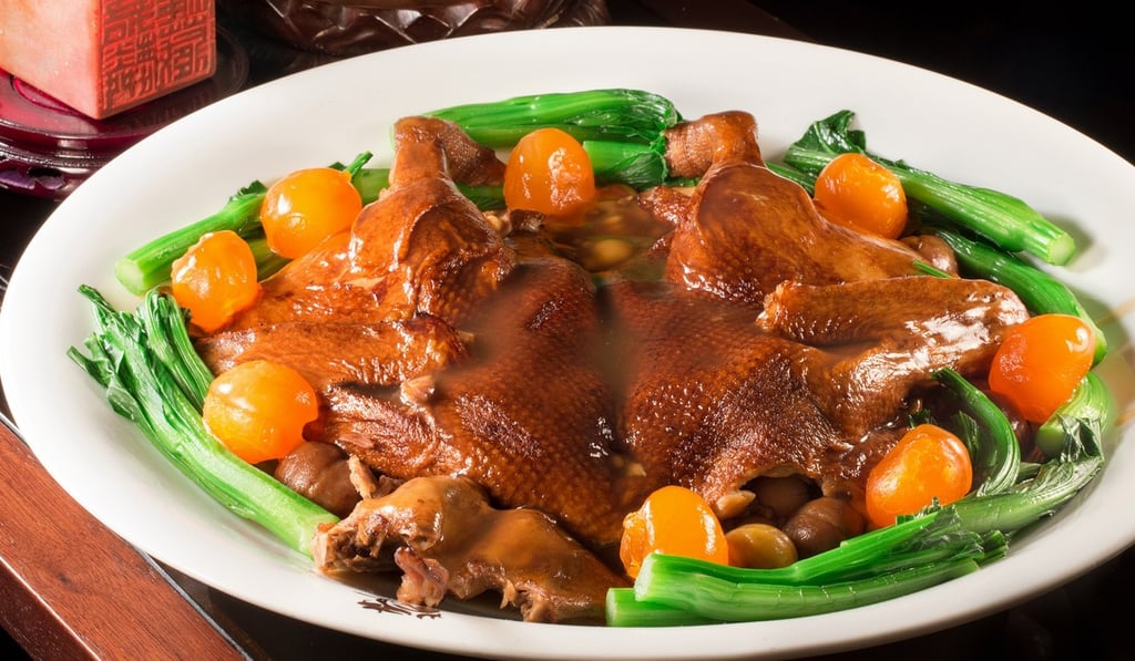 Eight treasures braised duck, stuffed with assorted meat, mushrooms, beans and salty egg yolk.