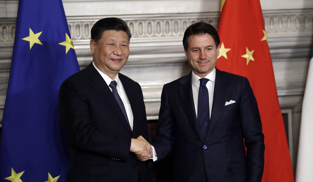 Chinese President Xi Jinping shakes hands with Italian Prime Minister Giuseppe Conte after the signing ceremony on Saturday. Photo: AP Chinese President Xi Jinping shakes hands with Italian Prime Minister Giuseppe Conte after the signing ceremony on Saturday. Photo: AP