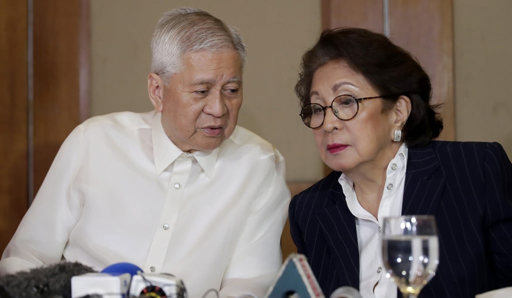 The Philippine former foreign secretary Albert del Rosario and former Ombudsman Conchita Carpio-Morales. Photo: AP