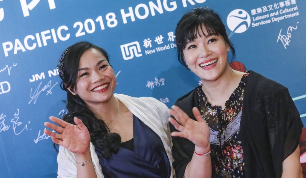 Sarah Lee (left) and Alison Yu share the stage during the sporting Oscar’s red carpet.