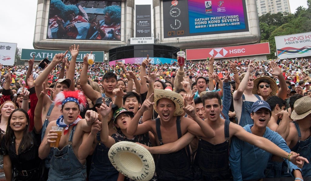 Hong Kong Stadium’s South Stand (above) is known for its boisterous fans, many of whom turn up during the event in fancy dress. Photo: Hong Kong Tourism Board