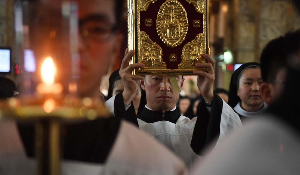 Worshippers at the state-sanctioned South Cathedral in Beijing. Photo: AFP
