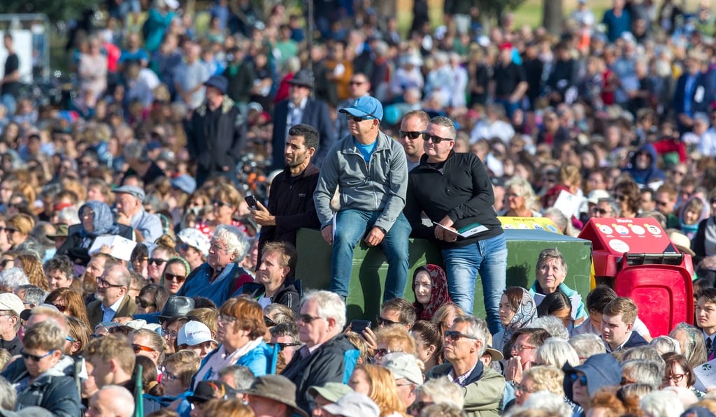 An estimated 20 thousand people attend the National Remembrance Service to those who were tragically killed in the Al Noor Mosque and the Linwood Islamic Centre shooting at Hagley Park. Photo: EPA