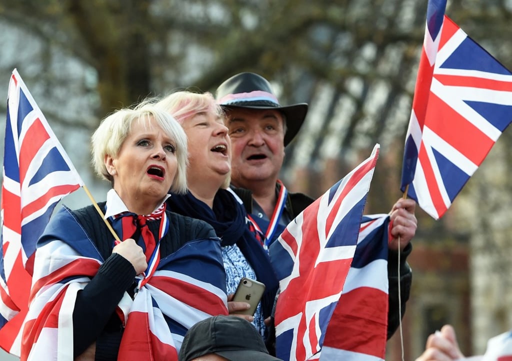Brexit supporters rally outside Parliament in London on Friday. Photo: EPA Brexit supporters rally outside Parliament in London on Friday. Photo: EPA