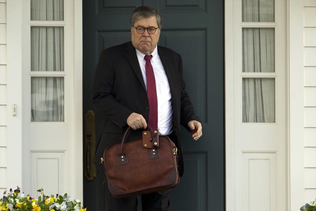 US Attorney General William Barr leaves his home in McLean, Virginia, on March 22. Photo: AP