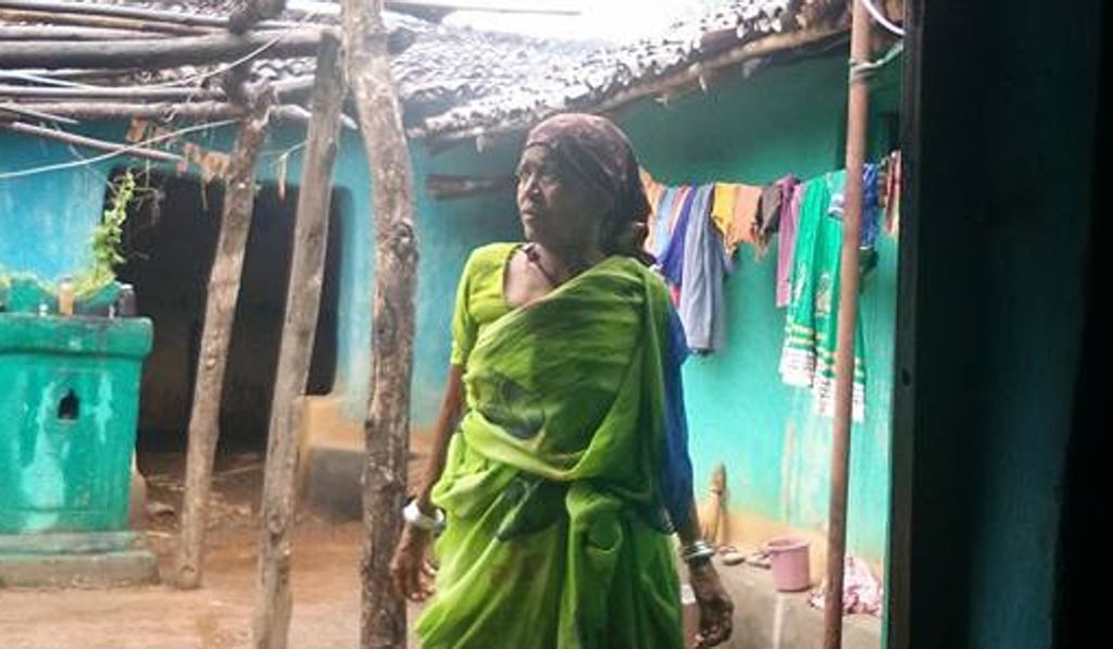 Vijayalakshmi Porte stands in front of her family home. Photo: Raksha Kumar Vijayalakshmi Porte stands in front of her family home. Photo: Raksha Kumar