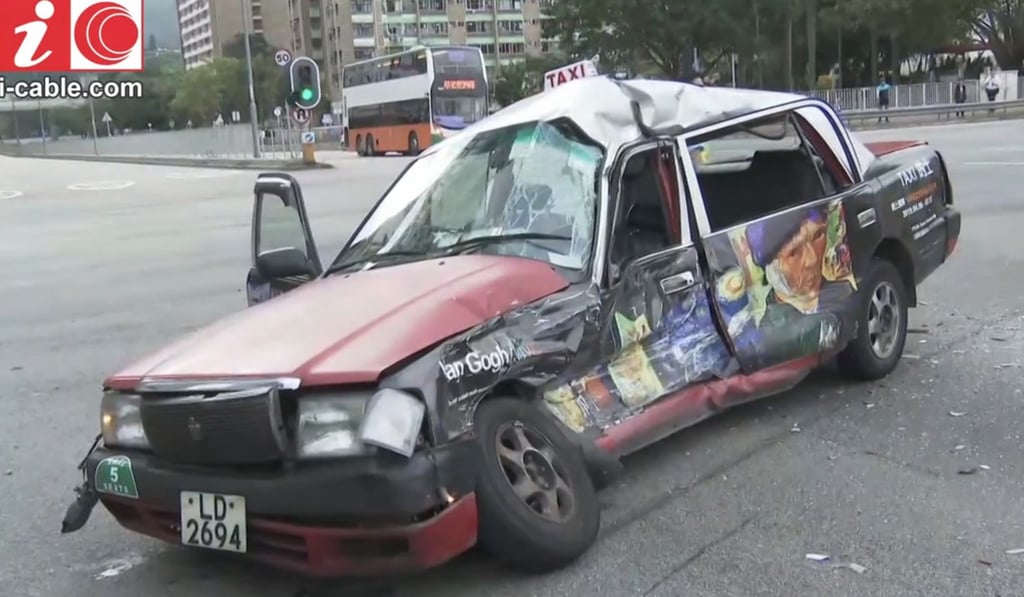 News video footage showing the smashed taxi.
