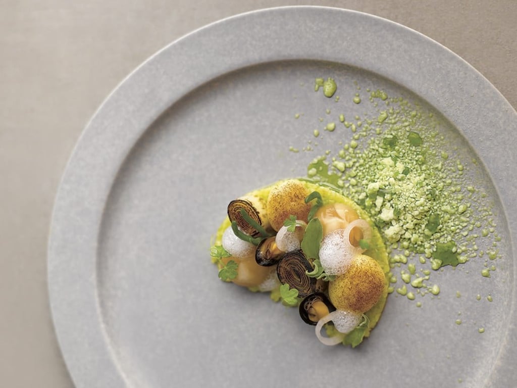A clam dish served at Restaurant André, chef André Chiang’s former eponymous restaurant in Singapore, which he closed in 2018.