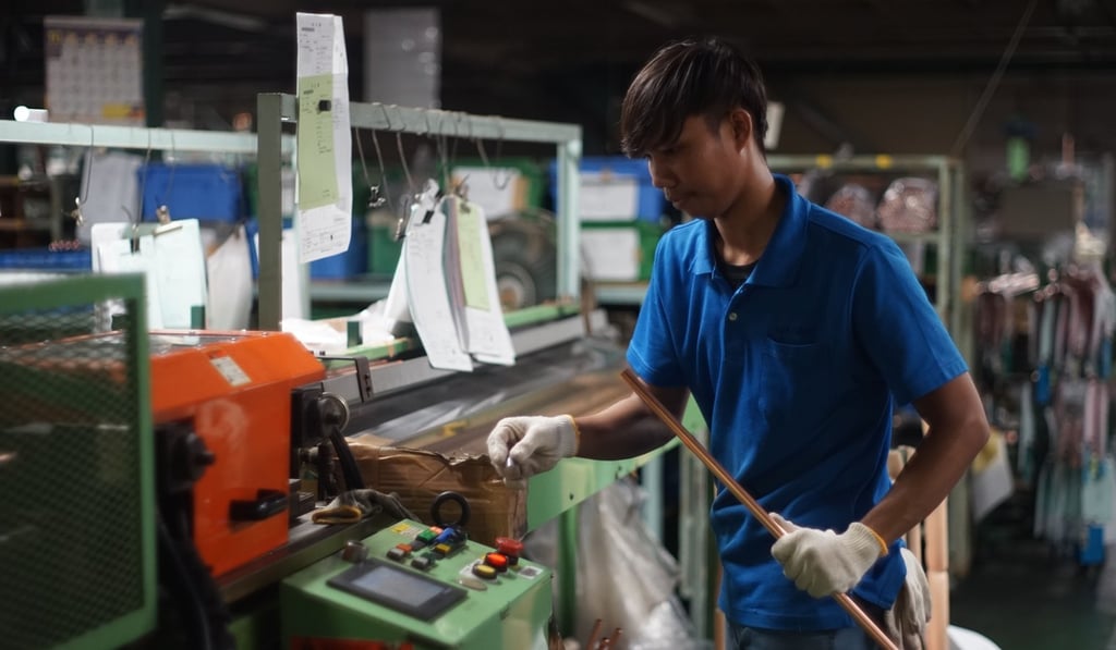An Indonesian worker at a factory in Oizumi, Gunma prefecture. Photo: AFP