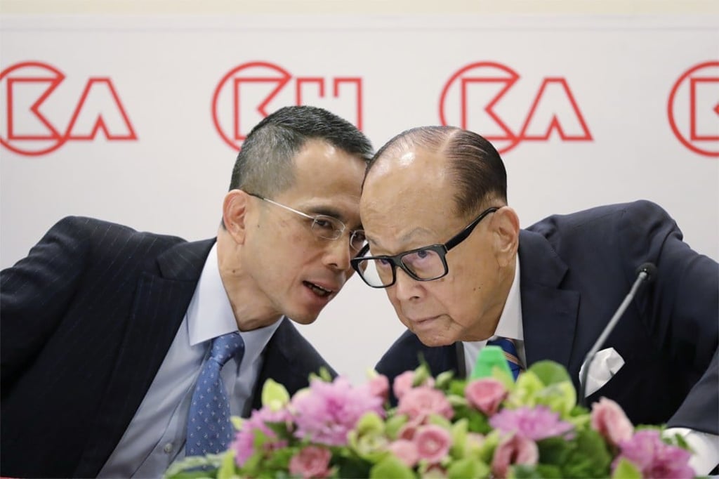 Li Ka-shing (right), founder of CK Asset Holdings and CK Hutchison Holdings, with Victor Li (left) during a press conference in Hong Kong, during which the elder Li announced his retirement to hand over his business empire to his elder son. Photo: AP