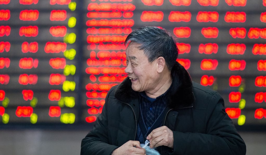 An investor enjoys a light moment at the stock exchange in Nanjing, Jiangsu province, on March 4. The star of the season was China, as the Shanghai Stock Exchange rose by nearly 24 per cent. Photo: Xinhua