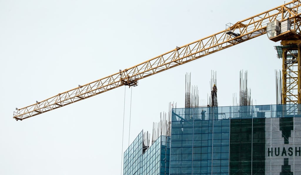 Builders work on the site of a commercial building in Shenzhen, Guangdong Province, China, 16 March 2019. Shenzhen, a city of 12 millions and with Special Economic Zone in China, is home to over 1100 completed high-rises. Photo: EPA-EFE Builders work on the site of a commercial building in Shenzhen, Guangdong Province, China, 16 March 2019. Shenzhen, a city of 12 millions and with Special Economic Zone in China, is home to over 1100 completed high-rises. Photo: EPA-EFE
