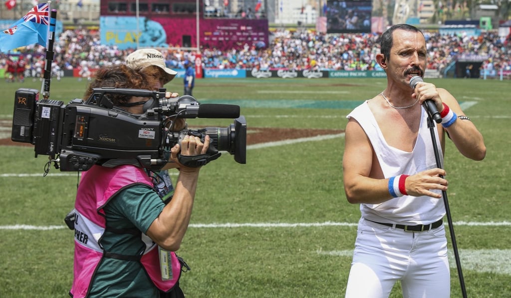 A performer dressed as Freddie Mercury entertains at Hong Kong Stadium. Photo: Benjamin Sieur