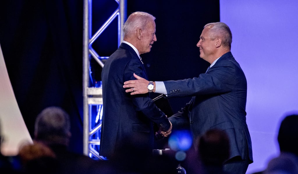 Biden greeted by Lonnie Stephenson. Photo: Bloomberg