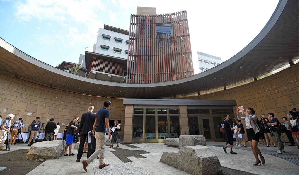 Media take a tour of the new AIT complex in June. Staff will move to the new premises on May 6. Photo: AFP