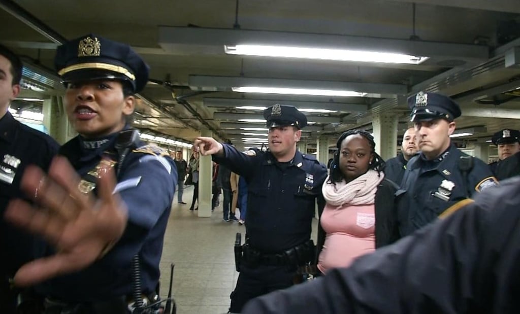 New York City police arrest Melanie Liverpool at a Times Square train platform in New York in this still image from video taken on November 7, 2016. Photo: Reuters