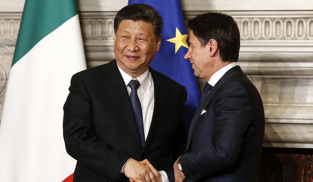 Italian premier Giuseppe Conte shakes hands with Chinese President Xi Jinping in Rome after Italy became the first G7 member to join the Belt and Road Initiative. Photo: EPA-EFE
