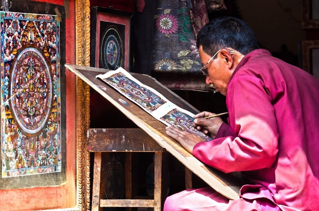 A thangka painting might just be the perfect souvenir, haggling is optional. Photo: Shutterstock