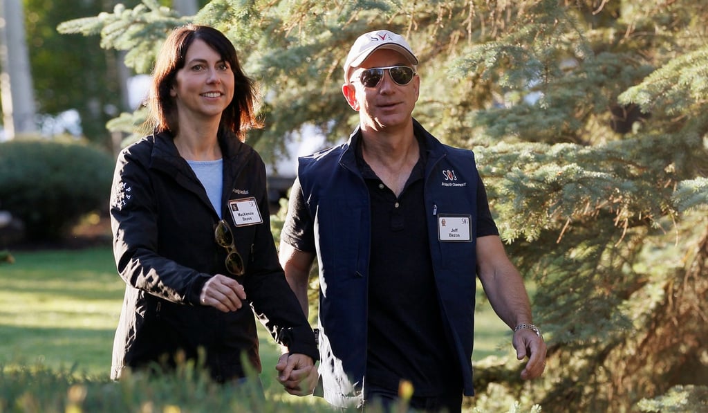 Amazon CEO Jeff Bezos (right) with MacKenzie Bezos, his wife of 25 years, in 2013, who have just finalised their divorce. Photo: Reuters