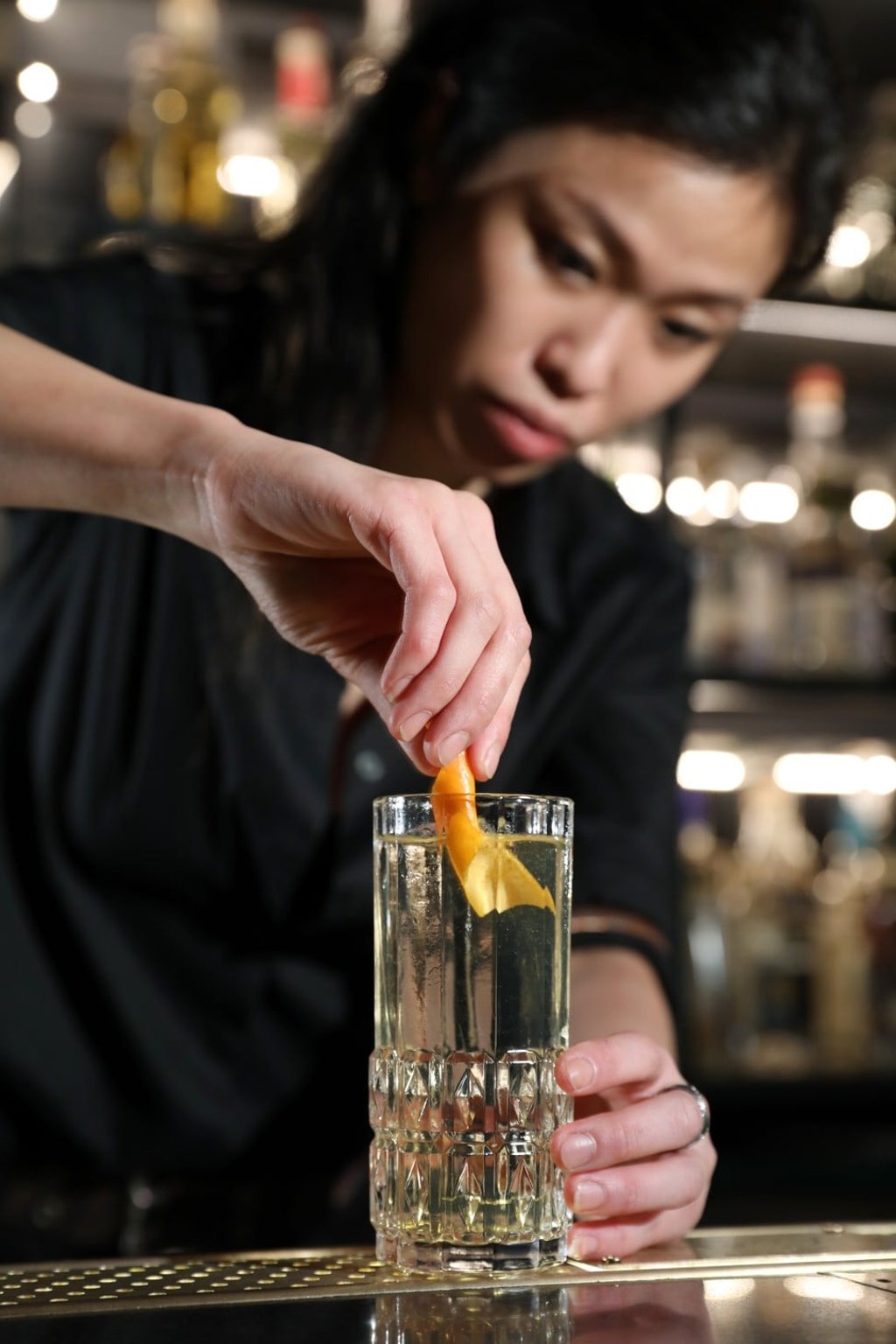 Heidi Cat Hou, head bartender of The ThirtySix, mixes a Highlander. Photo: Nora Tam
