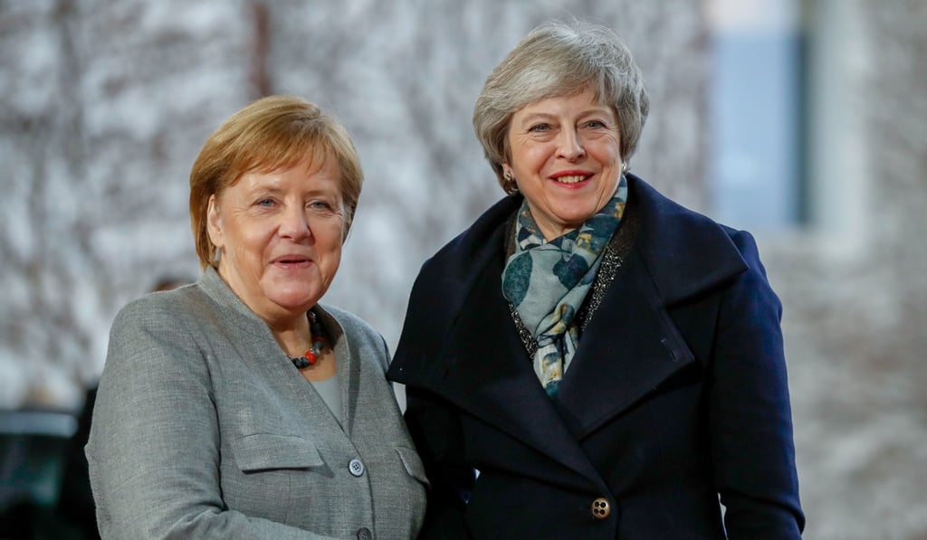 German Chancellor Angela Merkel (right) greets British Prime Minister Theresa May at the Chancellery in Berlin on December 11, 2018. Photo: AFP