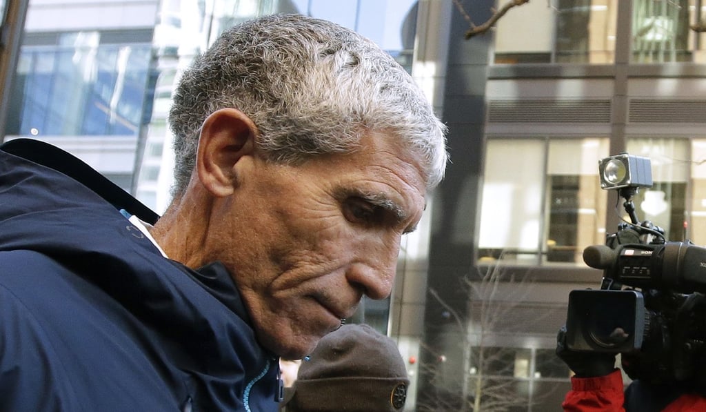 William “Rick” Singer leaves federal court in Boston on March 12, 2019 after pleading guilty to charges in a nationwide college admissions bribery scandal. Photo: AP William “Rick” Singer leaves federal court in Boston on March 12, 2019 after pleading guilty to charges in a nationwide college admissions bribery scandal. Photo: AP