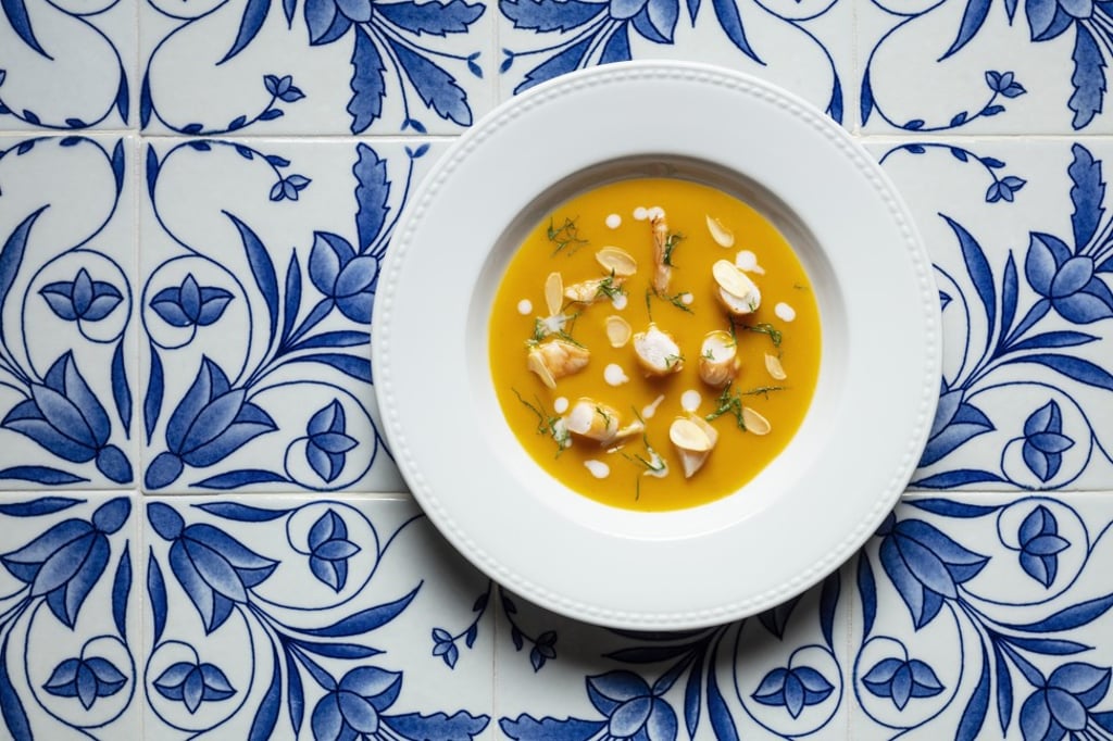 Roasted pumpkin soup with coconut cream and prawns at Chiado