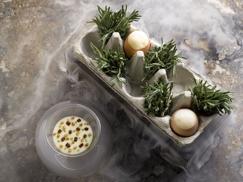 Signature rosemary-smoked organic egg dish at Odette. Signature rosemary-smoked organic egg dish at Odette.
