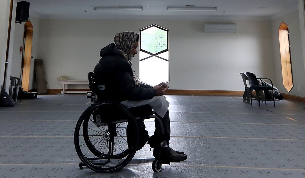 Farid Ahmed, a survivor of the Christchurch attacks, inside the Al Noor mosque, one of two targeted in a white supremacist terrorist attack in which 50 Muslims were shot dead. Photo: AFP Farid Ahmed, a survivor of the Christchurch attacks, inside the Al Noor mosque, one of two targeted in a white supremacist terrorist attack in which 50 Muslims were shot dead. Photo: AFP
