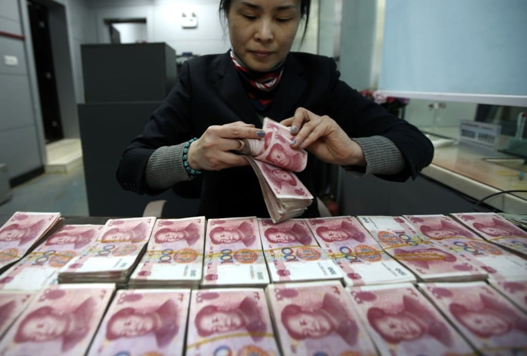 Beijing only allows an individual a US$50,000 foreign exchange quota limit per year. Photo: AP
