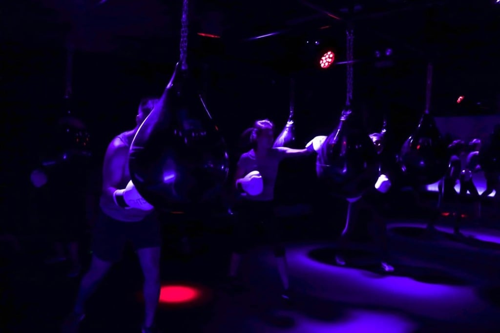 Lights Out is a concept boxing gym that infuses a club-style atmosphere, decor and pulsating music with high-intensity movements.
