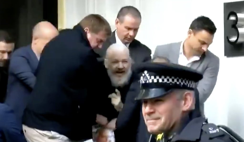 WikiLeaks founder Julian Assange’s arrest by British police on Thursday. Photo: Handout