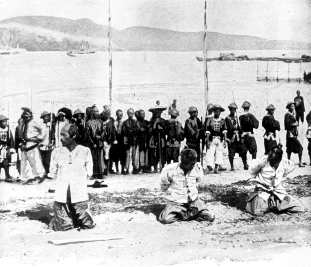 Chinese pirates charged with the hijacking of the SS Namoa off Hong Kong await execution in Kowloon in 1891.