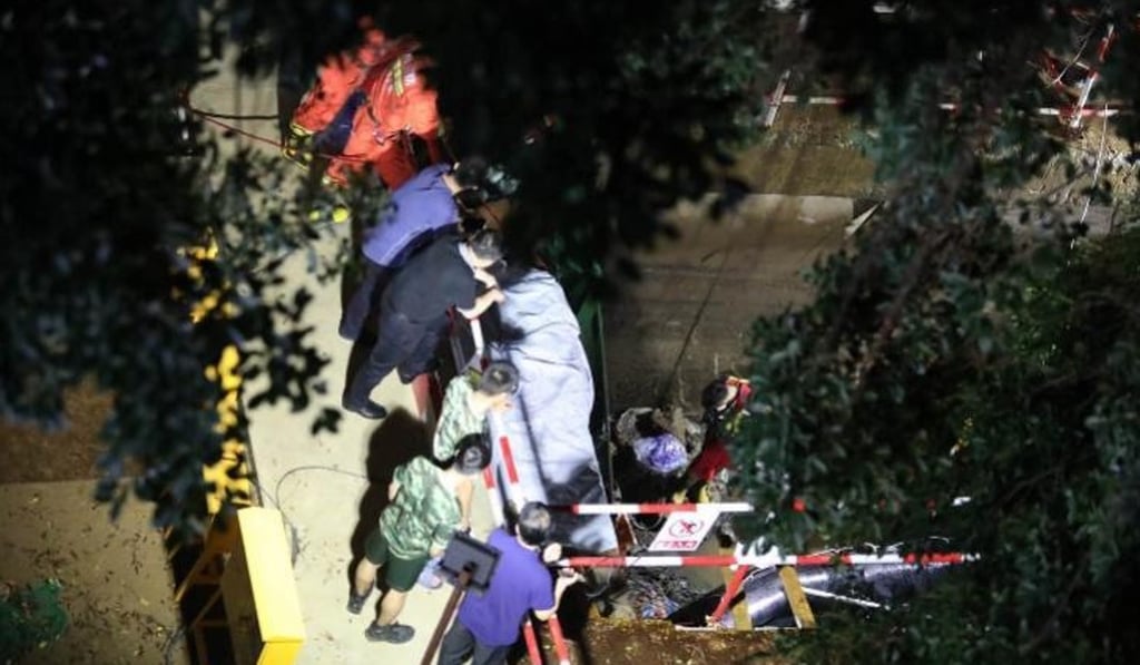 Drainage workers fell victim to a flash flood in Shenzhen on Thursday night, killing 11 people. Photo: Weibo