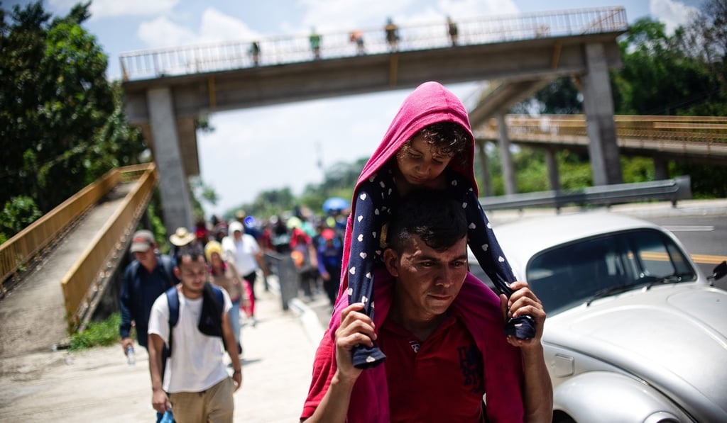 Central American migrants heading in caravan to the US make their way into Mexico on Friday, April 12, 2019. Photo: AFP Central American migrants heading in caravan to the US make their way into Mexico on Friday, April 12, 2019. Photo: AFP