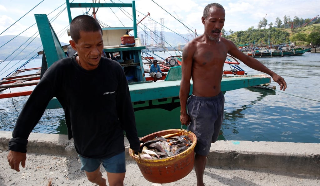 Philippine fishermen have been deterred from entering waters around Thitu Island by a swarm of Chinese vessels. Photo: Reuters