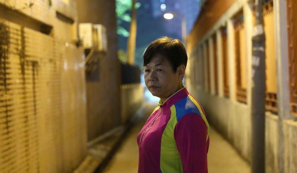 Security guard Yu Mei-wan at the Tai Yuen Estate in Tai Po. Photo: Sam Tsang