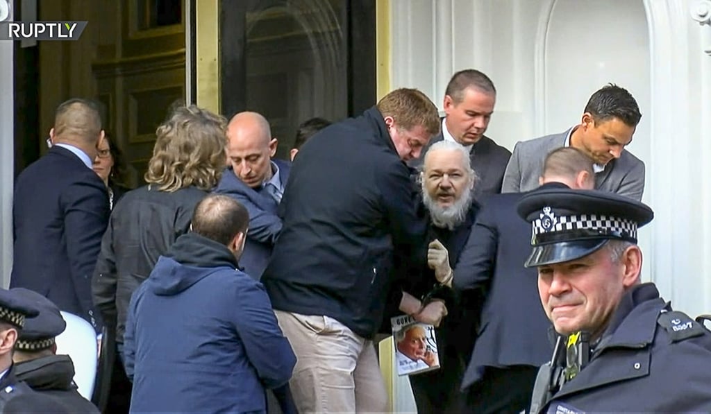 Julian Assange being dragged out of Ecuador’s embassy in London by police on April 11, 2019. Photo: Ruptly