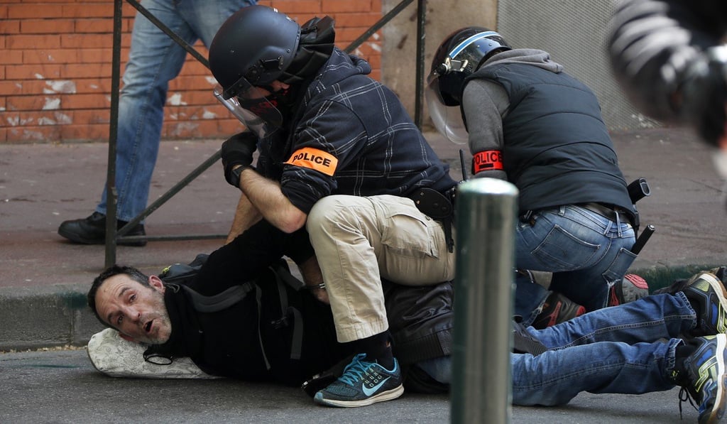 Police restrain a man during a protest by the Yellow Vests during the “Act XXII” demonstration – the 22nd consecutive national protest on a Saturday – in Toulouse. Photo: EPA-EFE
