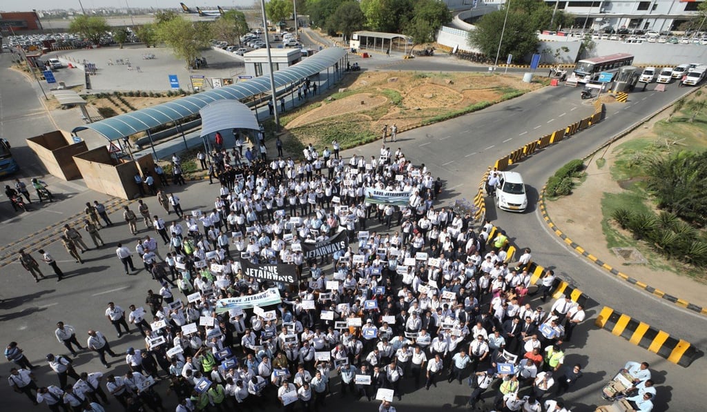 Jet Airways employees protest at Indira Gandhi International airport in Delhi. Photo: EPA-EFE Jet Airways employees protest at Indira Gandhi International airport in Delhi. Photo: EPA-EFE