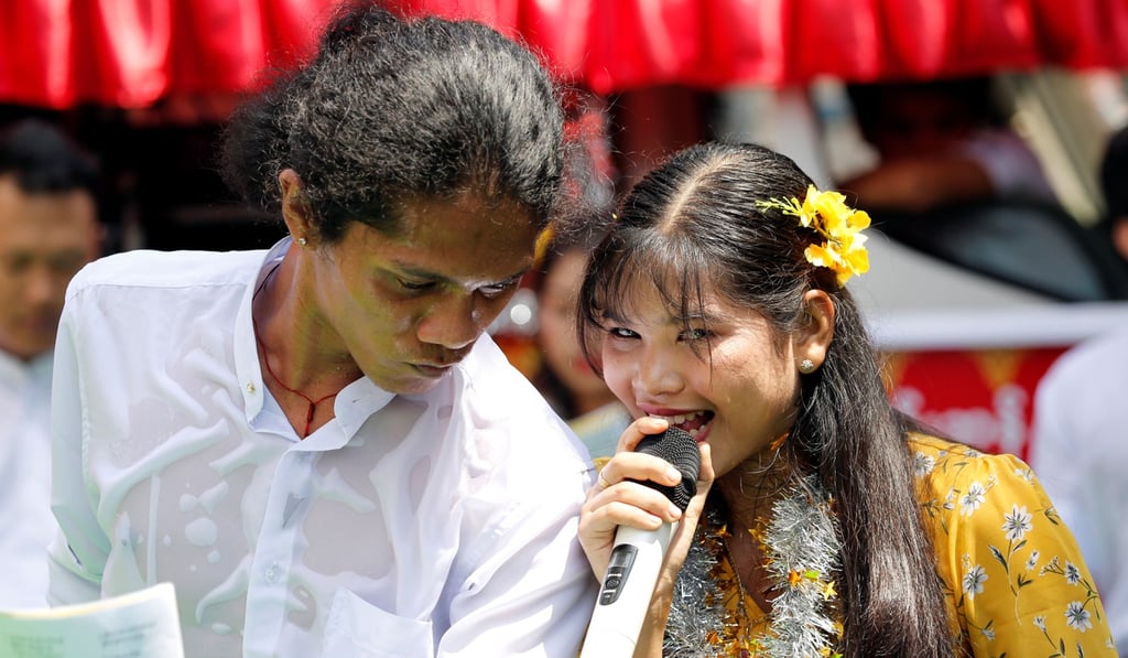 Students from Dagon University perform Burmese traditional slam poetry or thangyat during Burmese New Year in Yangon. Photo: Reuters