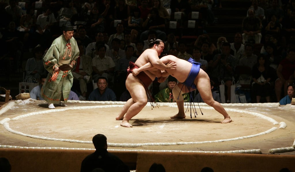 Sumo wrestlers fight at the Grand Sumo Tournament in Hawaii. Hawaii has produced top sumo wrestlers in the past, but none are likely to win in front of Trump during his visit in May. Photo: AFP